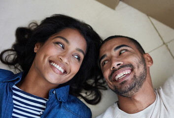 Poster - They bring out the best in each other. Shot of an affectionate young couple relaxing at home together.