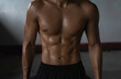 © Watcharin - Young man with fit and firm muscle