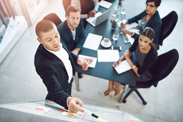 Aufkleber - This is how we will transform the company. Shot of businesspeople having a meeting in a boardroom.