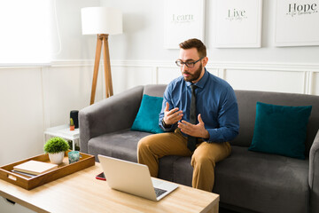 Wall Mural - Handsome man speaking with a virtual recruiter