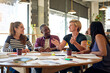 © Tamani Chithambo/peopleimages.com - Heres what I got from the lecture. Shot of a group of young friends having a study session in a cafe.