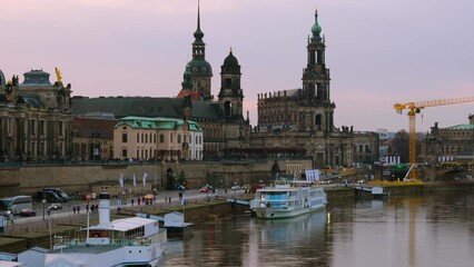 Sticker - Dresden, Germany. View at main landmarks in the city of Dresden, Germany at sunset. Time-lapse from day to night with car traffic and reflection in the river, panning video