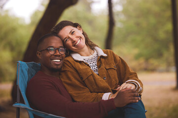 Canvas Print - Nothing says I love you like your undivided attention. Shot of a woman sitting on her boyfriends lap while out camping in the wilderness.