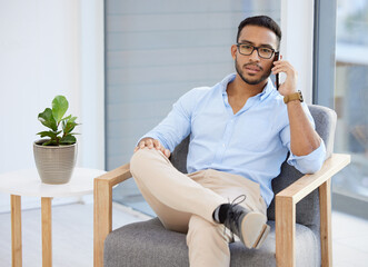 Aufkleber - Making connections is as easy as picking up your phone. Shot of a young businessman using a smartphone at work.