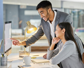Aufkleber - People who feel understood do more. Shot of a young businessman and businesswoman using a computer in a modern office.