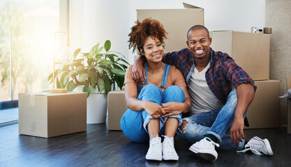 Aufkleber - moved out and moved in together. shot of an attractive young couple moving house.