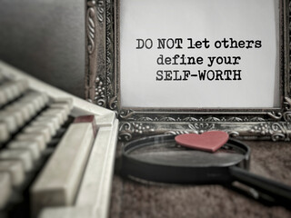 Wall Mural - Inspirational and motivational quote of do not let others define your self-worth. Stock photo.