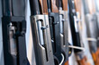 Close-up of guns in a row
