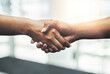© D Donson/peopleimages.com - When you find yourself a good deal, take it. Closeup shot of two unrecognizable businesswomen shaking hands while standing in a modern workplace.