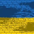 © longquattro - Ukraine flag grunge brick wall