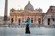Evening portrait of young woman on Piazza San Pietro in Vatican city.
