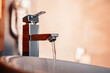 Water tap , faucet. Flow water in bathroom with sink. Modern clean hause. Hygiene concept. Panorama