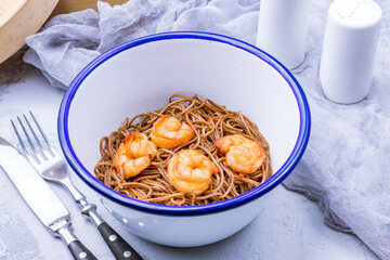 Wall Mural - Fried soba noodles with shrimps on the bowl