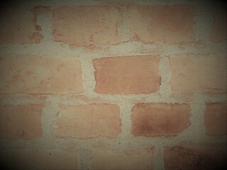 Wall Mural - a reddish brown brick wall as background