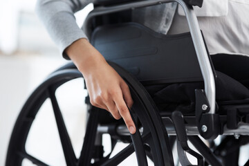 Sticker - Shes ready to get moving. Cropped shot of an unrecognizable businesswoman sitting in a wheelchair in the office.