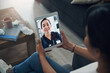 © Jeff Bergen/peopleimages.com - Im happy to see you again. Shot of an unrecognizable person on a videocall with a doctor.