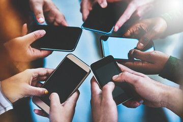 Aufkleber - Get connected with the people in your social network. Cropped shot of a group of people using their phones together.