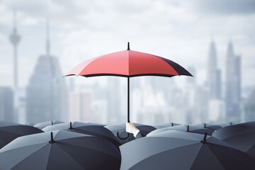Businessman hand holding red umbrella over crowd on blurry dull city background. Risk, protection and safety concept.