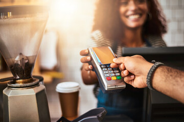 Poster - The smart, effortless and easy way to pay. Closeup shot of a customer making a credit card payment in a cafe.