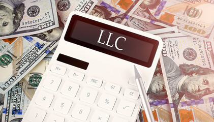 Poster - LLC text on display calculator on dollars background