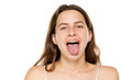 Young woman sticking tongue out on  a white background