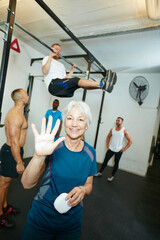 Sticker - Im all set. Shot of a group of people working out in the gym.