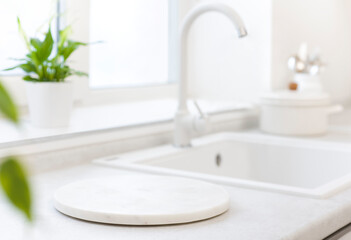 Wall Mural - marble pedestal on blurred kitchen counter sink for product display