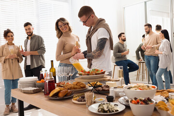 Sticker - Group of people enjoying brunch buffet together indoors