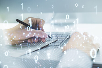 Leinwandbilder - Creative concept of binary code illustration and hand writing in notebook on background with laptop. Big data and coding concept. Multiexposure