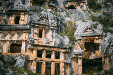 Wall Mural - The rock-cut tombs chambers on the south-west slope of the Acropolis. Myra Ancient City. Lycian Tombs. Demre, Antalya, Turkey.