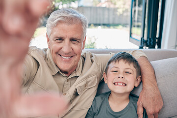 Aufkleber - Theres no place like home, except at grandpas. Shot of an adorable little boy taking selfies with his grandfather at home.