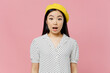 Young shocked surprised amazed woman of Asian ethnicity 20s wear white polka dot t-shirt yellow beret look camera with opened mouth isolated on plain pastel pink background. People lifestyle concept.