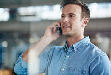 Poster - Hes a model employee. Cropped shot of a casually-dressed businessman standing in his office.