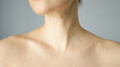 Woman with brown mole and nevus in collarbone area. Skin care concept.