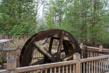 Photograph Of A Spinning Water Wheel