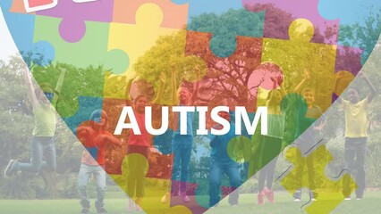 Wall Mural - Animation of autism awareness month text over puzzle and diverse children jumping