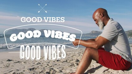 Poster - Animation of good vibes text over senior african american man sitting at beach