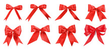 Set with beautiful red ribbons tied in bows on white background. Banner design