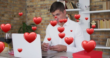 Poster - Animation of red hearts over caucasian man proposing with ring on video date