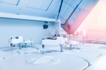 Wall Mural - closeup modern robotical machine for centrifuge testing sample tube with blood. medical laboratory e