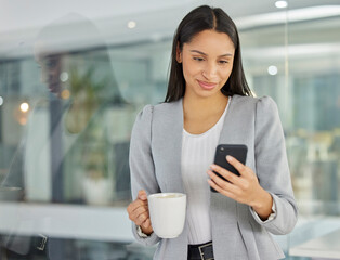 Poster - Keep your contact list fresh and full of opportunity. Shot of a young businesswoman using a smartphone and having coffee in a modern office.