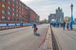 A lone cyclist on an empty Tower Bridge