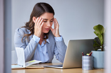 Poster - I just need some space to breathe. Shot of a businesswoman experiencing a headache at work.