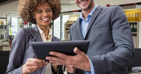 Poster - Animation of smiling diverse business people using tablet in office