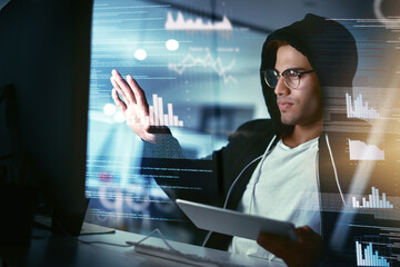 Poster - Hackers are the masters of stealth. Shot of a young hacker cracking a computer code in the dark.