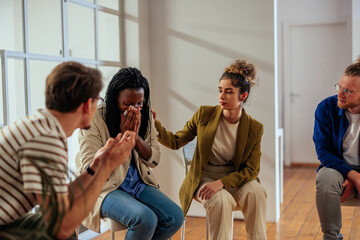 Wall Mural - Multiracial people with problems having a discussion while sitting together on special group therapy.