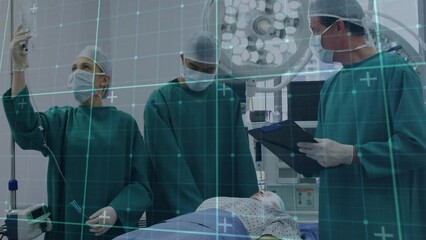 Poster - Animation of data processing over caucasian male surgeon using tablet