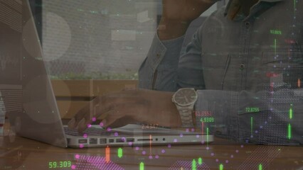 Poster - Animation of financial data and graphs moving over biracial man working on laptop