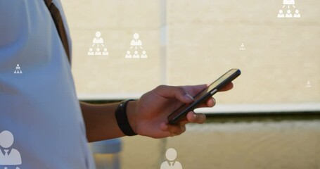 Poster - Animation of user icons over hands of biracial man using smartphone in city