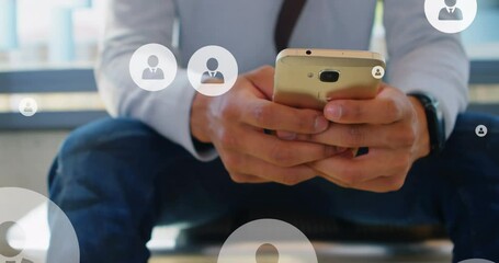 Poster - Animation of user icons over midsection of caucasian man using smartphone
